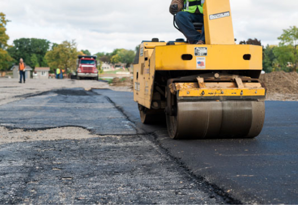 Paving a road in Canton, MI