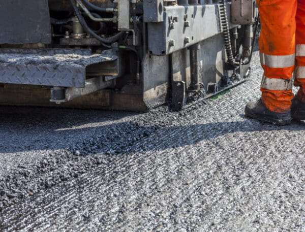 S&J asphalt paving working on a road